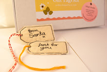 Load image into Gallery viewer, Gift tags with 'from Santa' and 'just for you' text, with a gift tag kit box in the background.