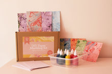 Load image into Gallery viewer, A complete DIY Paper Marbling Kit displayed on a table, showcasing all included materials for beginners.
