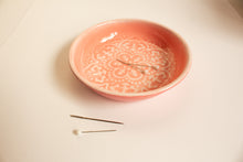 Load image into Gallery viewer, Pink ceramic dish with decorative patterns on a white surface