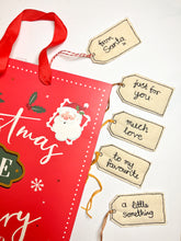 Load image into Gallery viewer, Gift tags arranged around a festive gift tag
